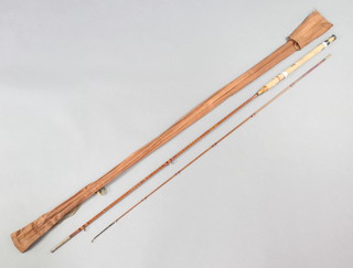 A Foster Bros. of Ashbourne 9'6" split cane trout fishing rod in brown cloth bag