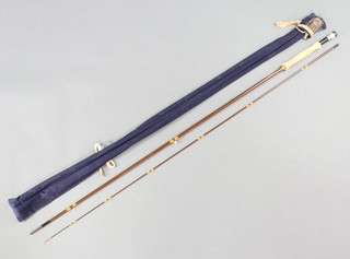 A Hardy Fibalite fly fishing rod 8'6" with 6 lines in a blue cloth bag 