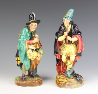 Two Royal Doulton figures - The Mask Seller HN2103 23cm and the Pied Piper HN2102 24cm 