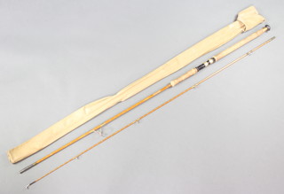 A modern Arms Capella 10' split cane carp fishing rod, contained in correct bag