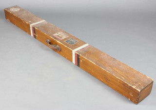 An Edwardian wooden travelling fishing rod box the top with 3 labels and marked TCS Cope Hylands Nr Kendall 12cm h x 102cm w x 18cm 