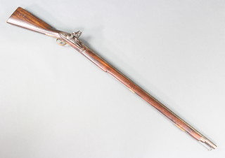 A flintlock muzzle loader musket, the lock marked Tower and with crown, the butt marked 999, having a  97.5 cm barrel and complete with ram rod 