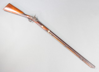 A 19th Century muzzle loading percussion sporting gun with 90cm barrel, the top marked London fine twist, having carved walnut stock  