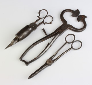 A pair of 19th Century polished steel sugar cutters, ditto wick trimming scissors (leg f), ditto grape scissors
