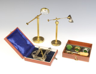 A Black of London Sloan pattern objective changer boxed, together with an F.Koristka N44132 slide stage, contained in a plush box and with 2 other items