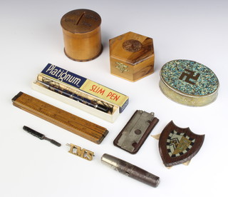 A Platignum slim pen boxed, an oval gilt metal box with hinged lid decorated a swastika 3cm x 9cm x 7cm (hinge f), a Jigger pocket knife/cigar cutter, a steel multipurpose tool fitted a gimlet, corkscrew, screwdriver, bodkin, various minor curios 