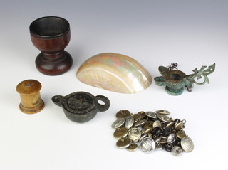 A Mauchline Ware cylindrical string box 4cm x 4cm, a turned wooden bowl set a George V half penny 8cm x 5cm, 2 oil lamps, a collection of auxiliary fire service buttons and other curios 