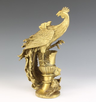 A gilt metal figure of a Ho Ho bird 27cm x 7cm