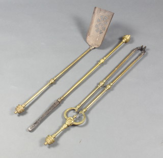 A 19th Century brass 3 piece fireside companion set comprising poker, tongs and shovel 