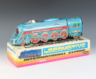 A Chinese BSH tinplate model of a locomotive  boxed 
