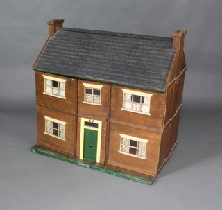 A 1930's wooden dolls house "Dukes Oak" 90cm h x 93cm w x 53cm d 
