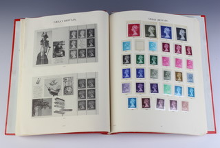 A red Windsor album of GB decimal stamps in singles, booklets and prestige booklets
