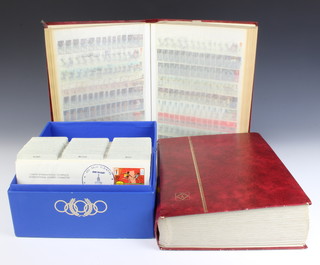 Two stock books of Elizabeth II mint and used stamps together with a collection of 1980 Olympic Games first day covers