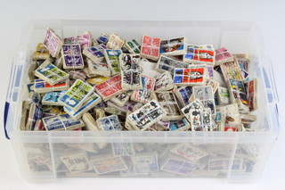 A crate containing a large collection of Elizabeth II used GB stamps  