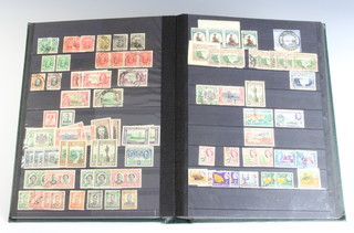 A stock book of mint and used world stamps Edward VII and later including South Africa, Cape of Good Hope, Transvaal, Gold Coast, Northern and Southern Rhodesia, Sierra Leone, Kenya,  Zanzibar 