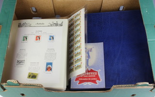 A loose leaf album of stamps mint and used Australia, sheet of Isle of Man stamps and an album of Australian stamps 1913-1963 and various other loose leaf stamps etc 