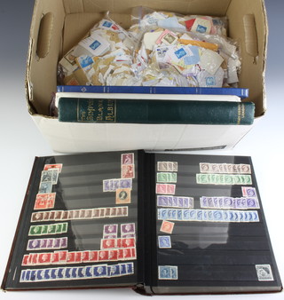2 albums of world stamps, 2 stock books of world stamps and a collection of loose world stamps
