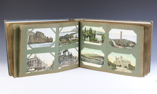 A postcard album of coloured and black and white postcards, scenes of London, Naples, Egypt and others 