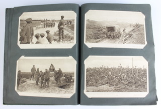 The Daily Mail Official War postcard album with various coloured and black and white postards