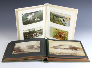 An album of black and white and coloured postcards of rural scenes and an Edwardian black and white photograph album of scenes of Stratford Upon Avon, Torquay, Sandwich, Folkestone, Oxford, etc 
