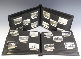 2 1930's black and white photograph albums containing photographs of Oakham, Henley, Venice