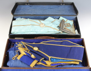Of Masonic interest, 2 leather cases containing a Royal Arch companions apron and sash, 2 Past Masters aprons, 3 Past Masters collars and collar jewels, a Past Provincial Grand Officer's undress apron and 3 collars