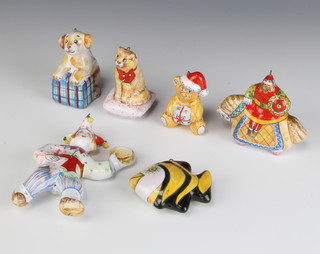 A 20th Century Russian ceramic Christmas tree decoration in the form of a cat sitting on a cushion and 5 others 