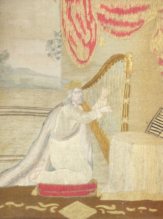 A 19th Century silk work embroidery of  King David playing a harp in a Hogarth mount 45cm x 34cm 