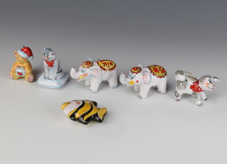 A 20th Century Russian ceramic Christmas tree decoration in the form of an elephant and 5 others