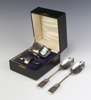 A cased silver christening set comprising bowl, spoon and napkin ring, Birmingham 1929 and 2 Victorian table spoons 214 grams 