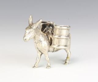 A Mexican silver figure of a donkey with double pannier, 87 grams 