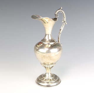 A Continental 900 standard ewer with S scroll handle 165 grams