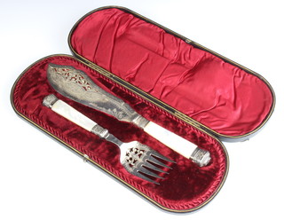 A cased pair of Edwardian silver plated fish servers with mother of pearl handles in a fitted case 