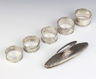 A silver mounted nail buffer Chester 1916, a Chinese silver napkin ring and 4 others, weighable silver 100 grams