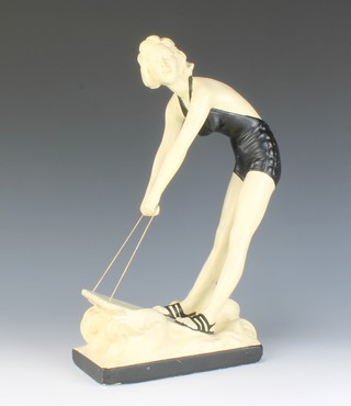An Art Deco plaster figure of a female water skier 38cm 