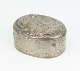 A Continental repousse silver oval trinket box decorated with cavorting cherubs amongst scrolls import marks London 1890 5.5cm x 4cm, 40 grams