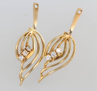 A pair of 14ct yellow gold diamond earrings 4.4 grams