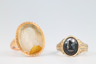 A 19th Century gold hardstone set seal ring size K, a Victorian ditto size I 