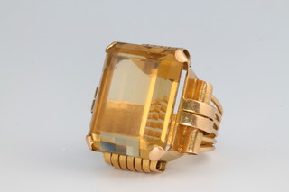 A stylish Art Deco style yellow gold topaz ring, the stone 23mm x 17mm, size L 