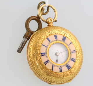 A lady's Continental 14ct yellow gold half hunter fob watch with enamelled numerals 