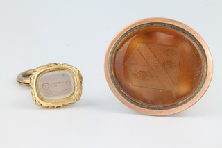 A 19th Century gilt hardstone seal, a smaller ditto 