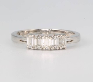 An 18ct white gold 5 stone baguette cut ring approx. 0.78ct, size O 