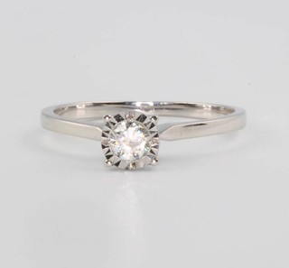 An 18ct white gold single stone brilliant cut diamond ring approx. 0.21ct, size L 1/2