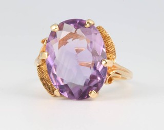 A 9ct yellow gold amethyst dress ring size M 