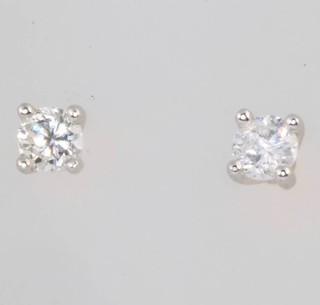 A pair of 18ct white gold single stone brilliant cut diamond ear studs, approx. 0.25ct