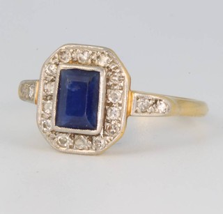 An 18ct yellow gold sapphire and diamond cluster ring size N 1/2