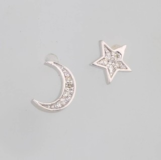A pair of 18ct white gold diamond set ear studs of a star and moon