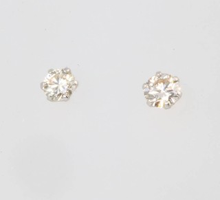 A pair of platinum single stone diamond ear studs approx. 0.3ct 