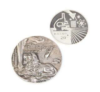 Two silver commemorative medallions 309 grams