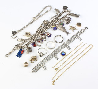A silver charm bracelet and minor jewellery including a gilt chain and gilt charms